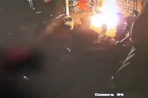 Source surveillance frame showing fire inside an industrial building