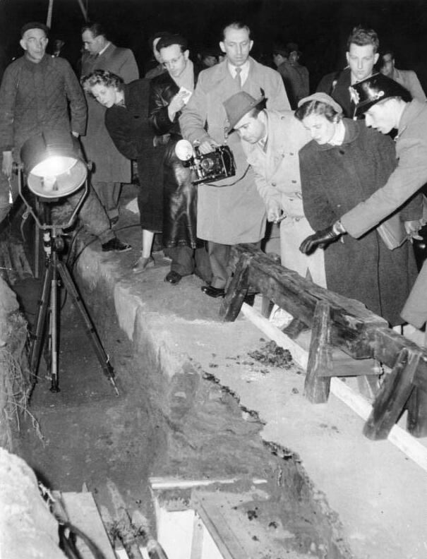 Journalists inspect the cable taps inside the Berlin spy tunnel