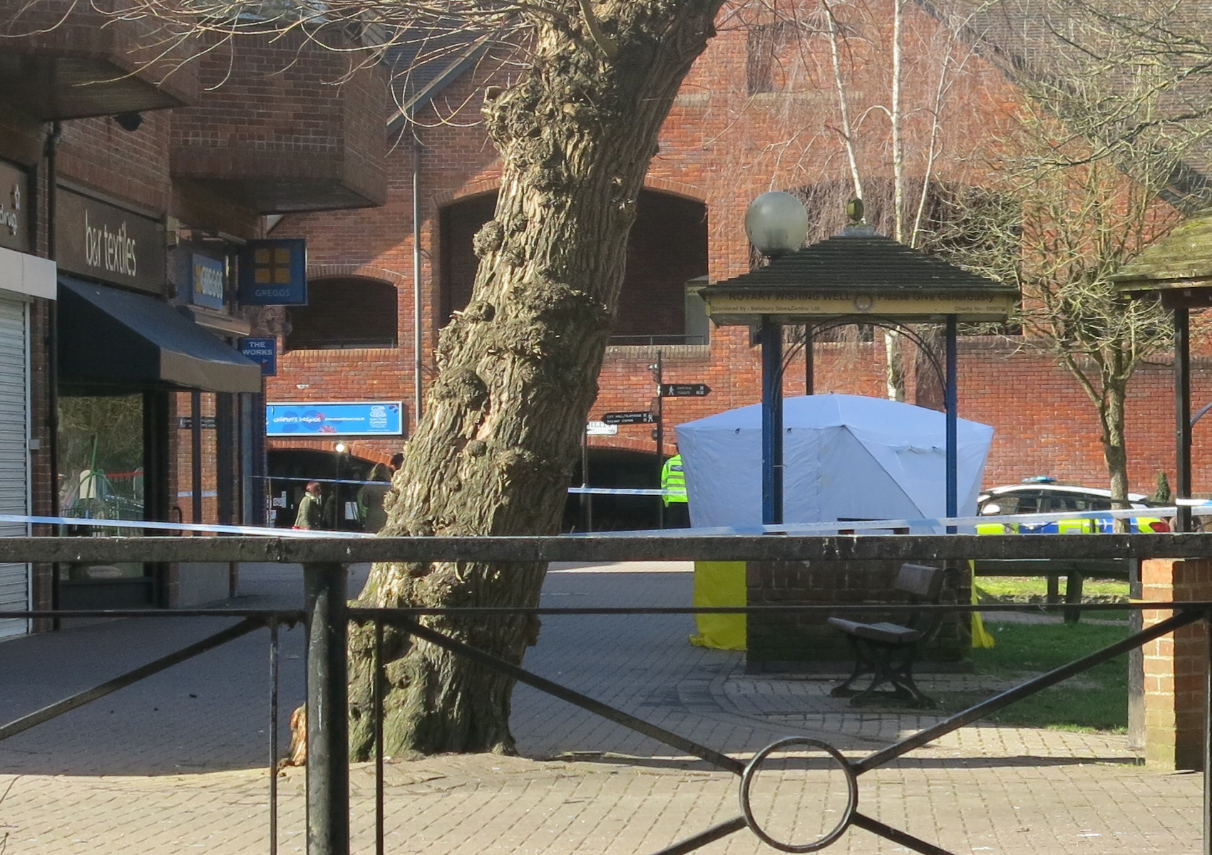 A forensic tent covers the bench at The Maltings in Salisbury where Sergei and Yulia Skripal collapsed.