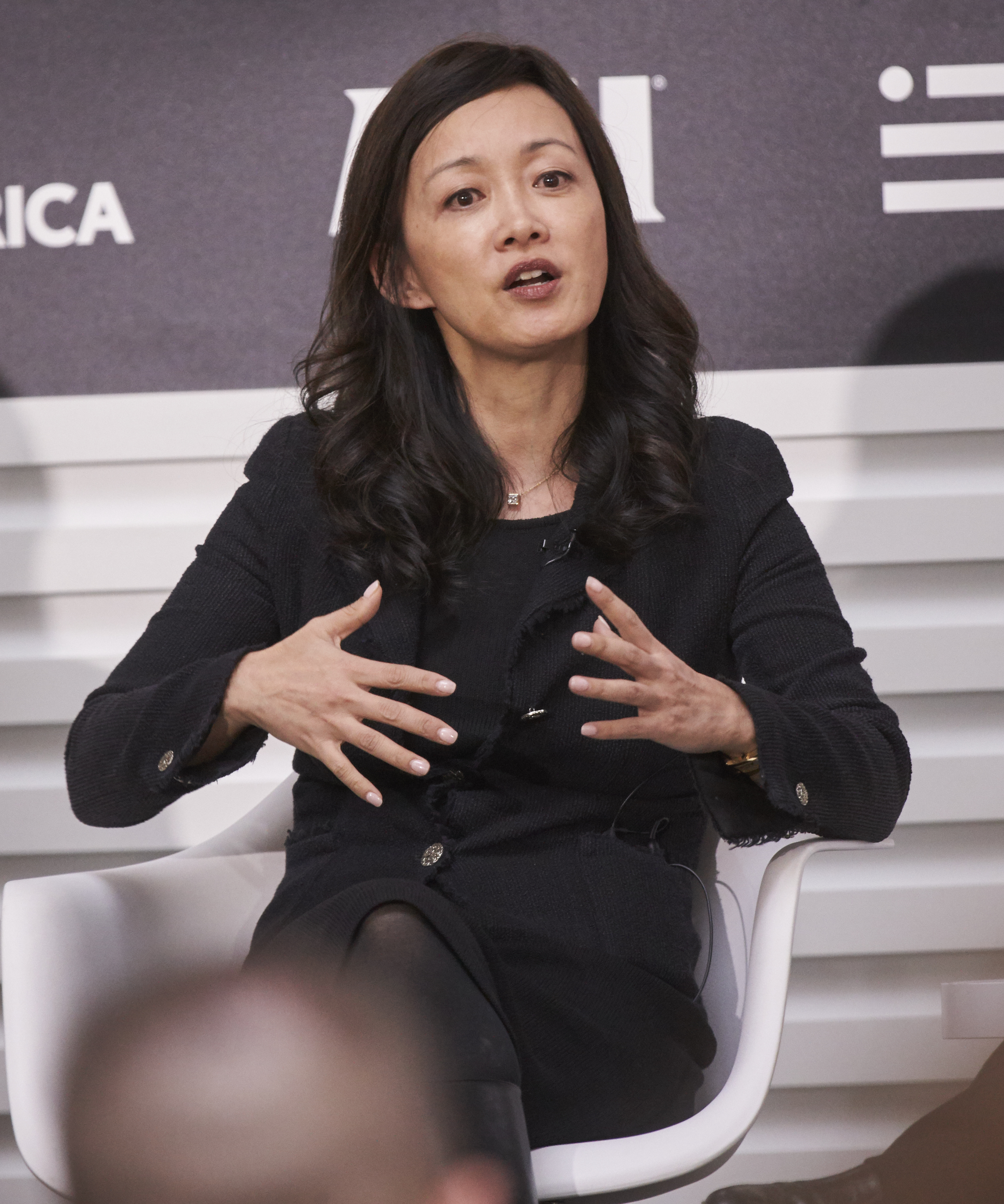 Sue Mi Terry speaking at a conference in 2018